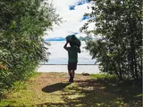 Person carrying a kayak